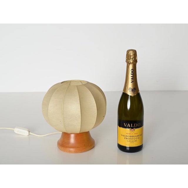 Wonderful mid-century cocoon table lamp designed by castiglioni and produced in italy during the 1970s. This stylish table...