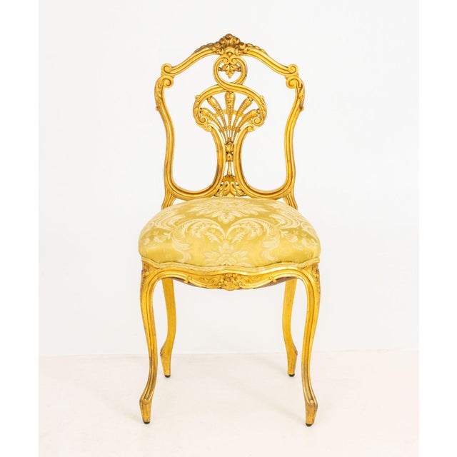 Rococo Revival Yellow Damask Upholstered Giltwood Side Chair, the reticulated back above cabriole legs. 34.5" H x 16.5" W...