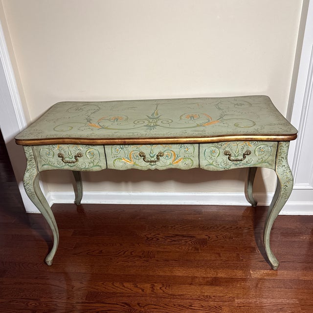 Beautiful vintage hand-painted writing desk / console table featuring elegant Italian-inspired design. This piece...