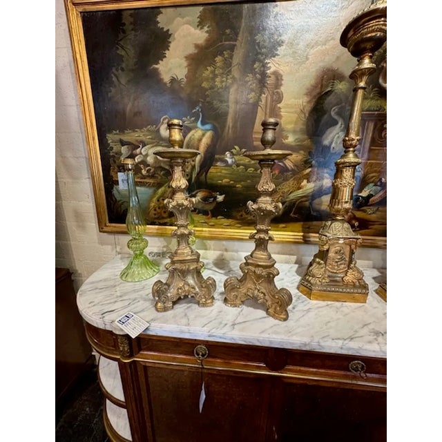 Nice pair of Italian antique carved and parcel gilt altar sticks. Makes a gorgeous accessory! Circa 1870. 26h x 10w