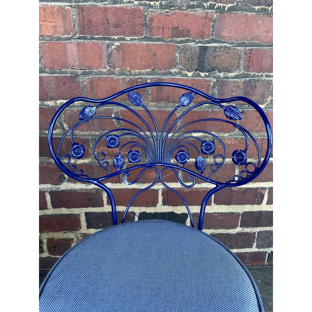 Professionally restored vintage patio set featuring six chairs and a dining table. Each piece has undergone meticulous...