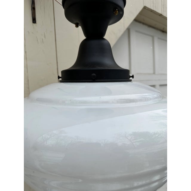Old lights On is pleased to offer this large vintage school house globe with dark brass flushmount fixture. It is wired...