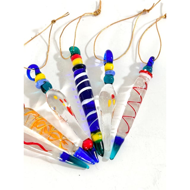 Set of six vintage handblown art-glass icicle ornaments, each individually formed with colorful applied glass details,...