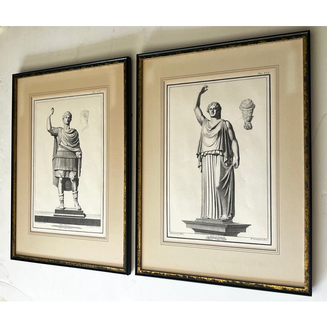 This pair of framed 18th-century Neoclassical Neapolitan etchings depict ancient Roman bronze statues discovered during...