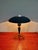 Philips tripod lamp, Bijou model, designed by Louis Kalff, 1950s-60s. This lamp, made of blue-green lacquered aluminum...