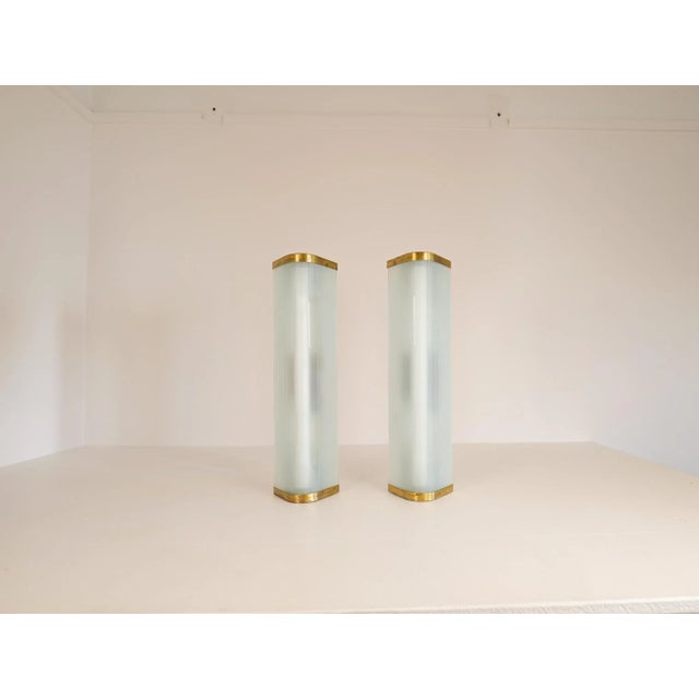 These very large wall mounted lamps were created in Sweden during the 1950s. They were most likely produced by ASEA. The...