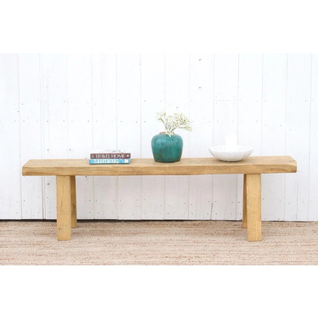 A robust reclaimed long rustic bench made from a 19th century architectural beam. This primitive bleached wood bench table...