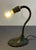 This vintage gooseneck desk lamp, produced by the renowned Aladdin Manufacturing Company of Muncie, Indiana, features a...