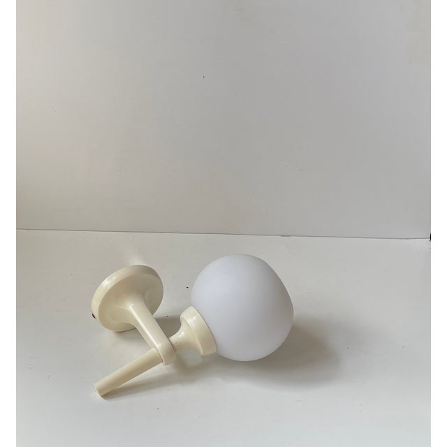 Space age fixed wall light in the style of max bill and e. R. Nele. Anonymous scandinavian maker circa 1970s. Electrical...