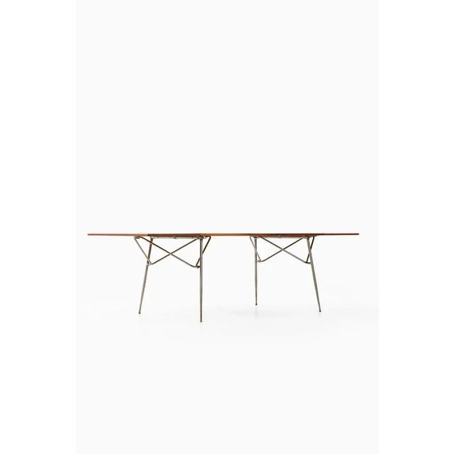Dining table / desk in teak and steel by børge mogensen, 1953 material: teak and steel style: mid century, scandinavia...