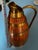 An elegant solid oak pitcher with a brass band, crafted by Gérard Lafitte and bearing the "Meilleur Ouvrier de France...