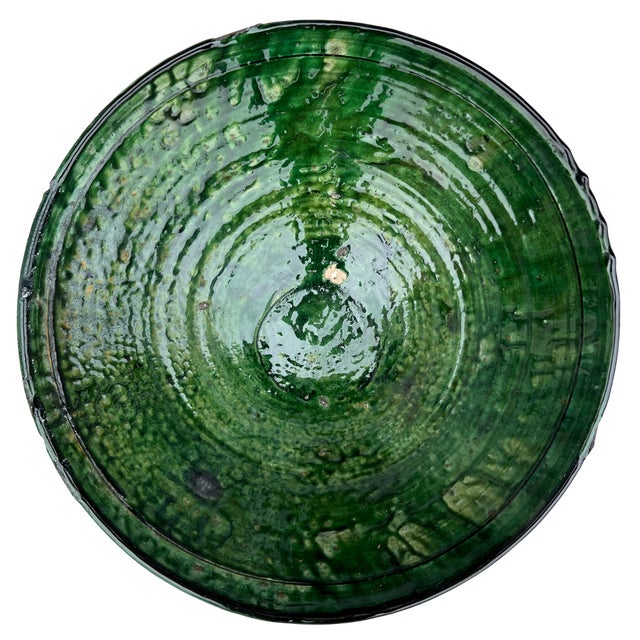 Handcrafted in southern Morocco, Tamegroute pottery is celebrated for its distinctive green glaze, organic forms, and...
