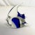 We have here a hand-blown glass Fish Paperweight Figural. It’s lovely with royal blue glass encased in the transparent...