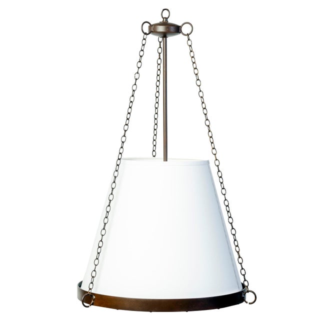 The Pendant with Shade is a classic light fixture. This timeless shade rests on a steel frame accented with mini-chain and...