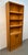 Add warmth, style, and functionality to your home with this classic Mid-Century Modern teak bookcase. Showcasing clean...