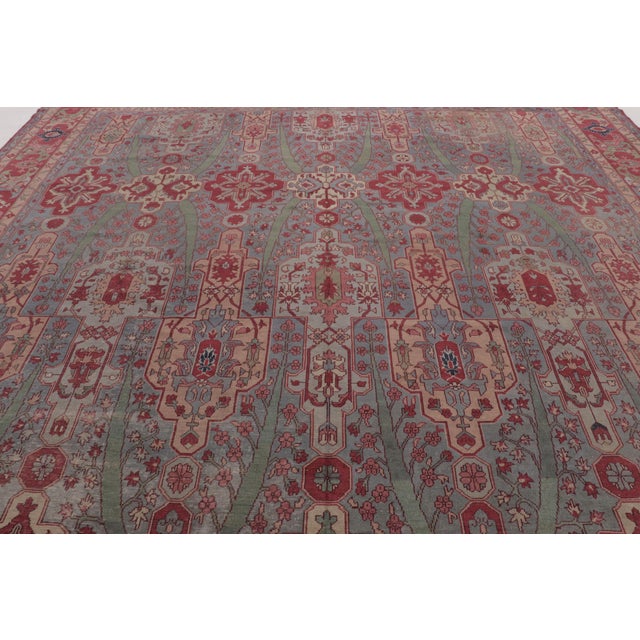 Hand-knotted in wool and originating circa 1900-1920, this 13x13 antique Turkish Ghiordes rug is an exceptional addition...