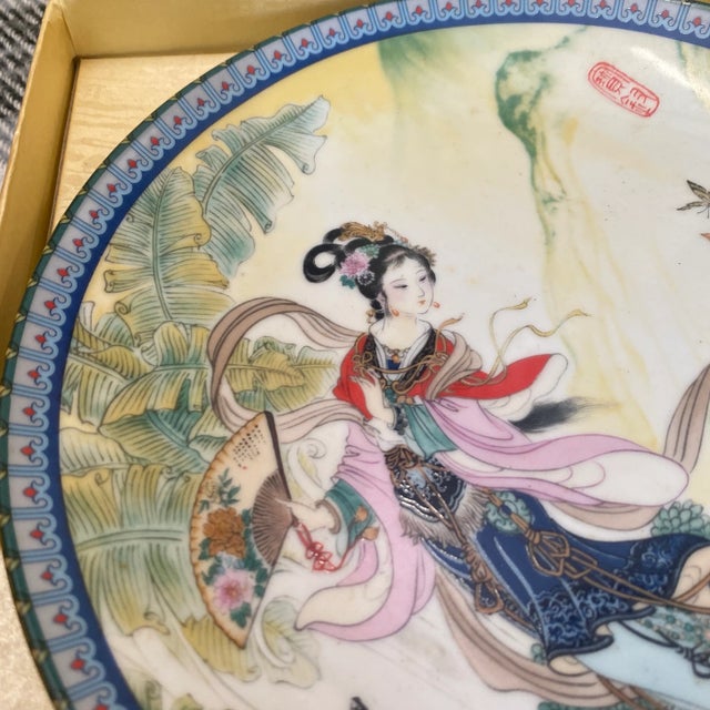 This is a beautiful hand painted chinoiserie style decorative plate. It has a detailed painting of a woman on it. Perfect...