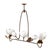 A 72-by-42-inch wall sculpture of intersecting steel bars in warm tones  magnolia petals abstracted to their outlines....