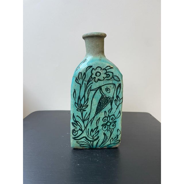 Discover cultural heritage with our set of 2 Turquoise Triangular White Qajar vases from Iraq—a pair stunning pieces that...