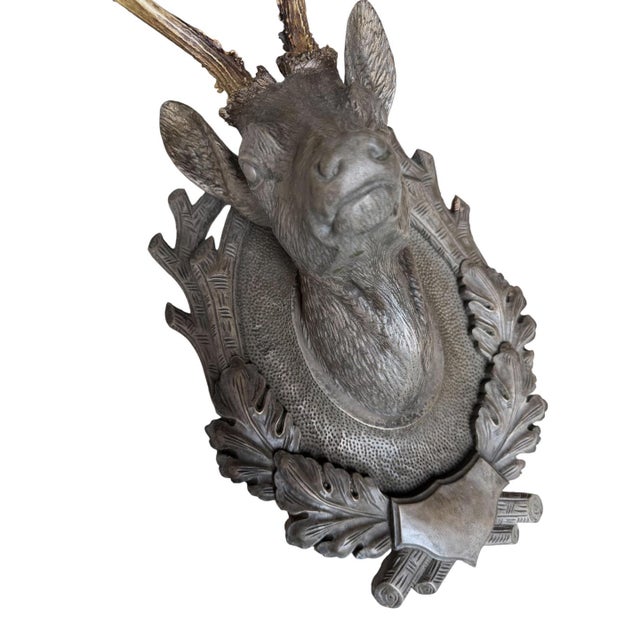 Cast deer head with real antlers. Made by Brad Hamn St Huber Studio in Denver gray in color 22" x 12.5" x 9"