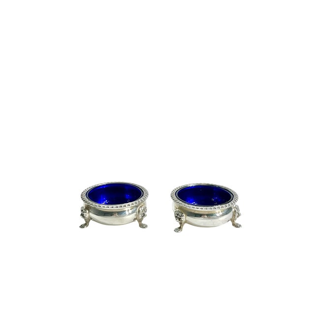 Pair of antique silver plate salt cellars with cobalt glass liners. The salt cellars are by Friedman Bros Silver from New...