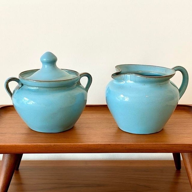 Beautiful 1960s robin’s-egg turquoise sugar and creamer set in Seagrove redware, attributed to J.B. Cole Pottery. Sourced...
