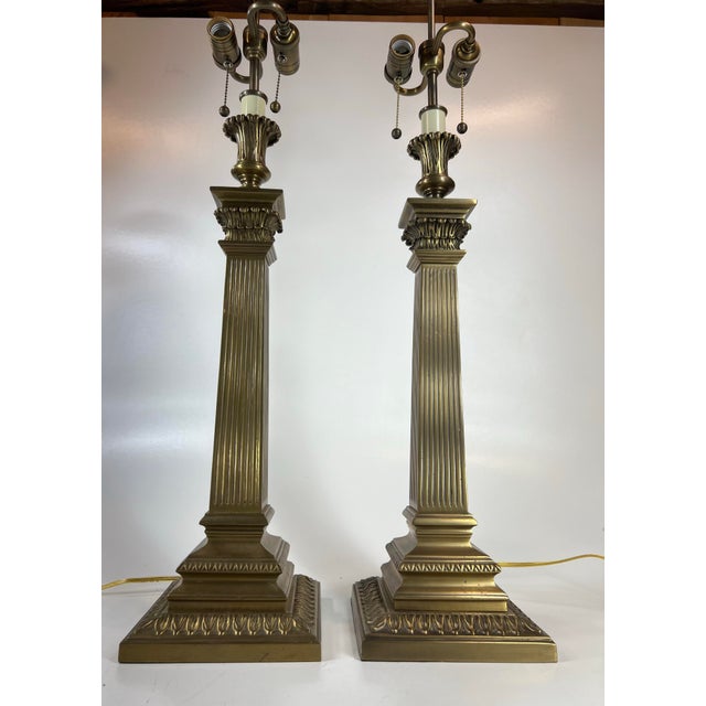 This pair of stylish Solid Brass lamps and are in beautiful condition. They feature 4-sided fluted columns with...