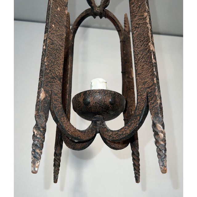 This very nice lantern is made of wrought iron. This is a French work. Circa 1950