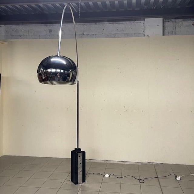 Iconic arc floor lamp attributed to Goffredo Reggiani and dating back to the 1970s. A classic example of Space Age...
