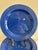 This set of 11 salad plates by Emile Henry, France, features a rich cobalt blue glaze with a ribbed, concentric rim in...