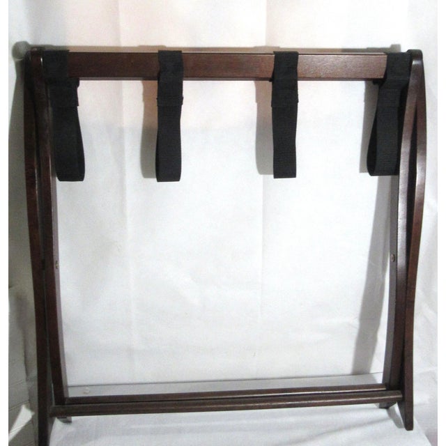 Really cool old hotel luggage stand. I also used it with a tray. Useful and pretty my favorite . Sweet addition to any...