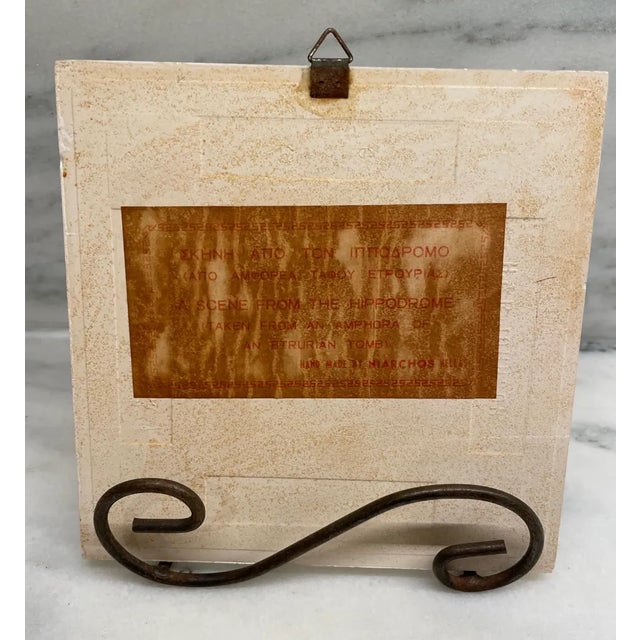 Hand Painted Grecian Ceramic Tile with Stand Depicting a Scene from the Hippodrome The back says: A scene from the...