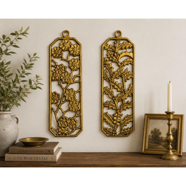 A wonderfully substantial pair of vintage cast-iron botanical wall panels with sculptural openwork branches and an aged...