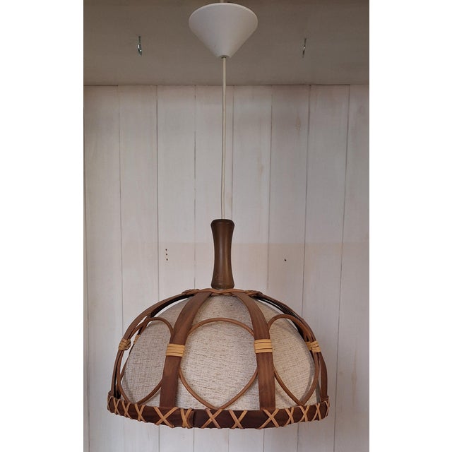 Vintage Teak and Raffia Ceiling Lamp with Beige Wool Shade, 1970s, in Very Good conditions. Designed 1970 to 1979 Up to...