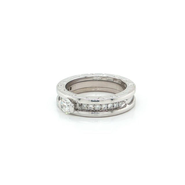 This authentic Bvlgari B.zero1 Diamond Solitaire Ring is a rare and luxurious piece crafted in 18k white gold. The elegant...