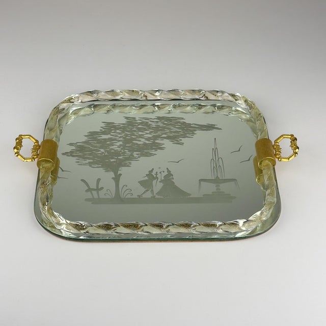 Amazing Murano tray made in Venice, Italy in the 1950s. The edge of the tray features a twisted glass border with ornate...
