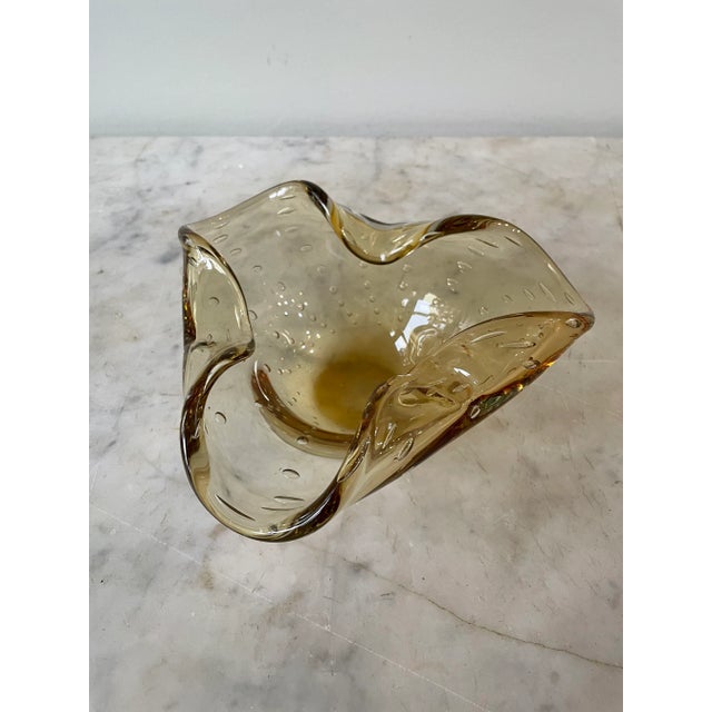 A lovely example of the perfect hand blown Murano glass bowl. Classic bubble design with three folded edges in a...