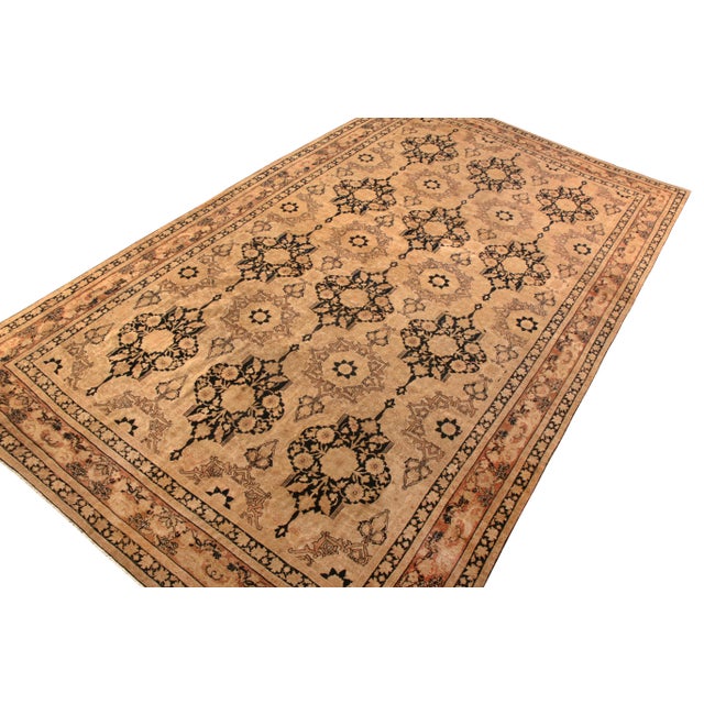 Hand-knotted in wool circa 1880-1890, this antique 9×16 Kerman Lavar Persian rug is a notable addition to Rug & Kilim’s...