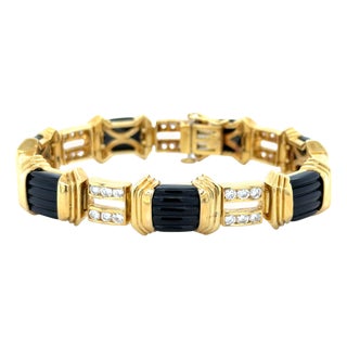 1980s La Triomphe 18k Gold Bracelet With Onyx and 2.5ct Vs1 F Diamonds For Sale