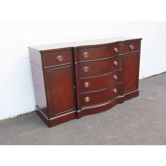 This magnificent Sideboard is made of wood, solid wood, mahogany, and veneer. The Cabinet was made by Drexel, and it is...