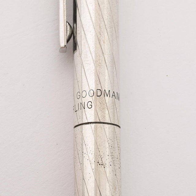 This Modernist Sterling Silver Ballpoint Pen, signed by Bergdorf Goodman, embodies the understated refinement and high-...