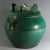 Circa 1885, Chinese emerald green shiwan pottery teapot in the shape of a traditional Chinese water carrying bucket with a...