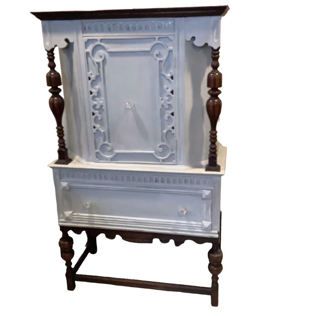 Gorgeous solid wood china, storage cabinet or bar cabinet with closed storage and lower drawer. Gorgeous wood carvings...