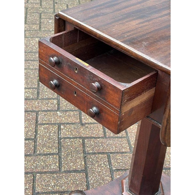 Mahogany Lamp Table, Side Table. with Drawer with flaps open 65 cms, closed 36.5 cms, 49.5 cms depth, 74.5 cms tall. It’s...