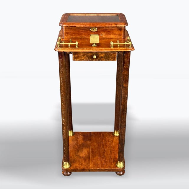Material: solid beech in combination with brass elements, glass. Corrected. This cigar table is not only a practical...