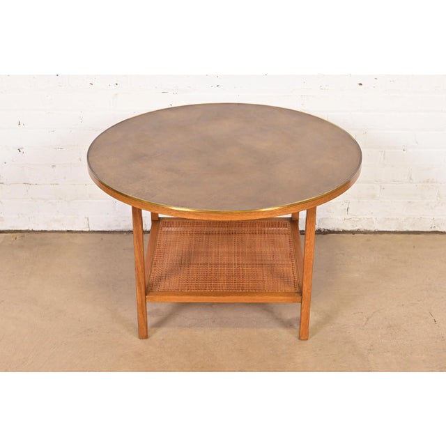 An exceptional Mid-Century Modern two-tier coffee table or cocktail table By Paul McCobb for Directional and produced by...
