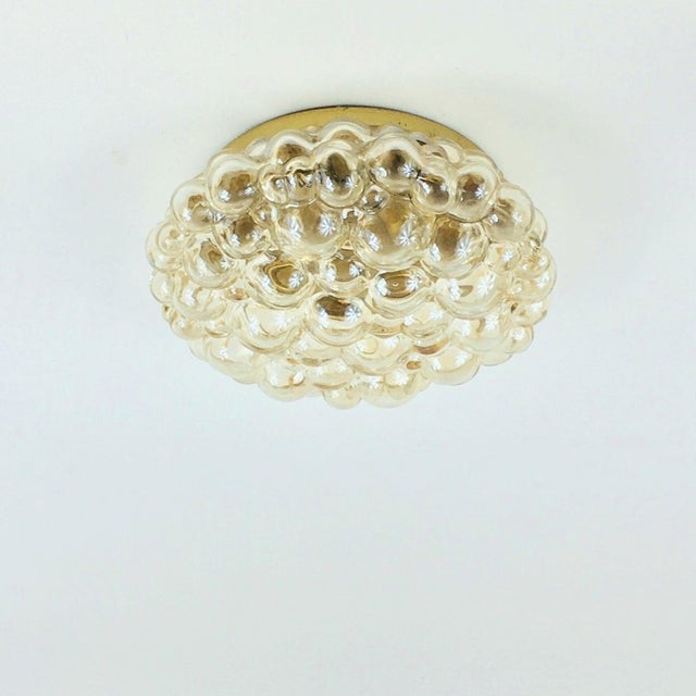 Stunning large & rare bubble glass ceiling mount fixture by Helena Tynell for Limburg (Germany, 1960s). The light...