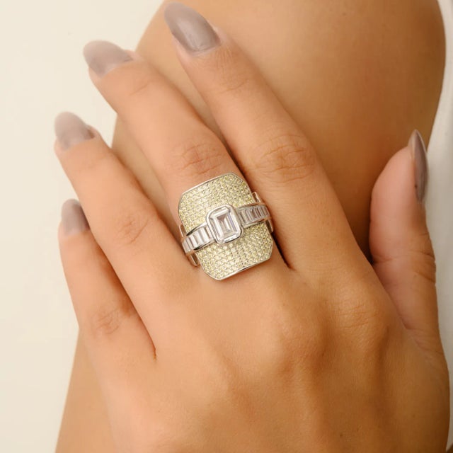 Add timeless glamour to your collection with this Art Deco Emerald Cut Statement Ring, beautifully crafted in sterling...