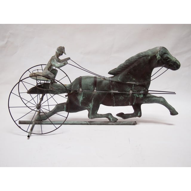 Sulky, Horse and Jockey Copper Weathervane. Weathered copper surface of a seated jockey mid race. Very good condition with...
