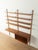 A classic shelving system from the 1960s. The high-quality containers and shelves are veneered in teak. The system...